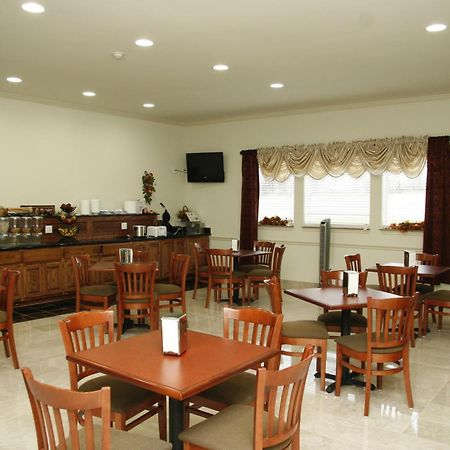 Budget Host Inn And Suites Cameron Chambre photo