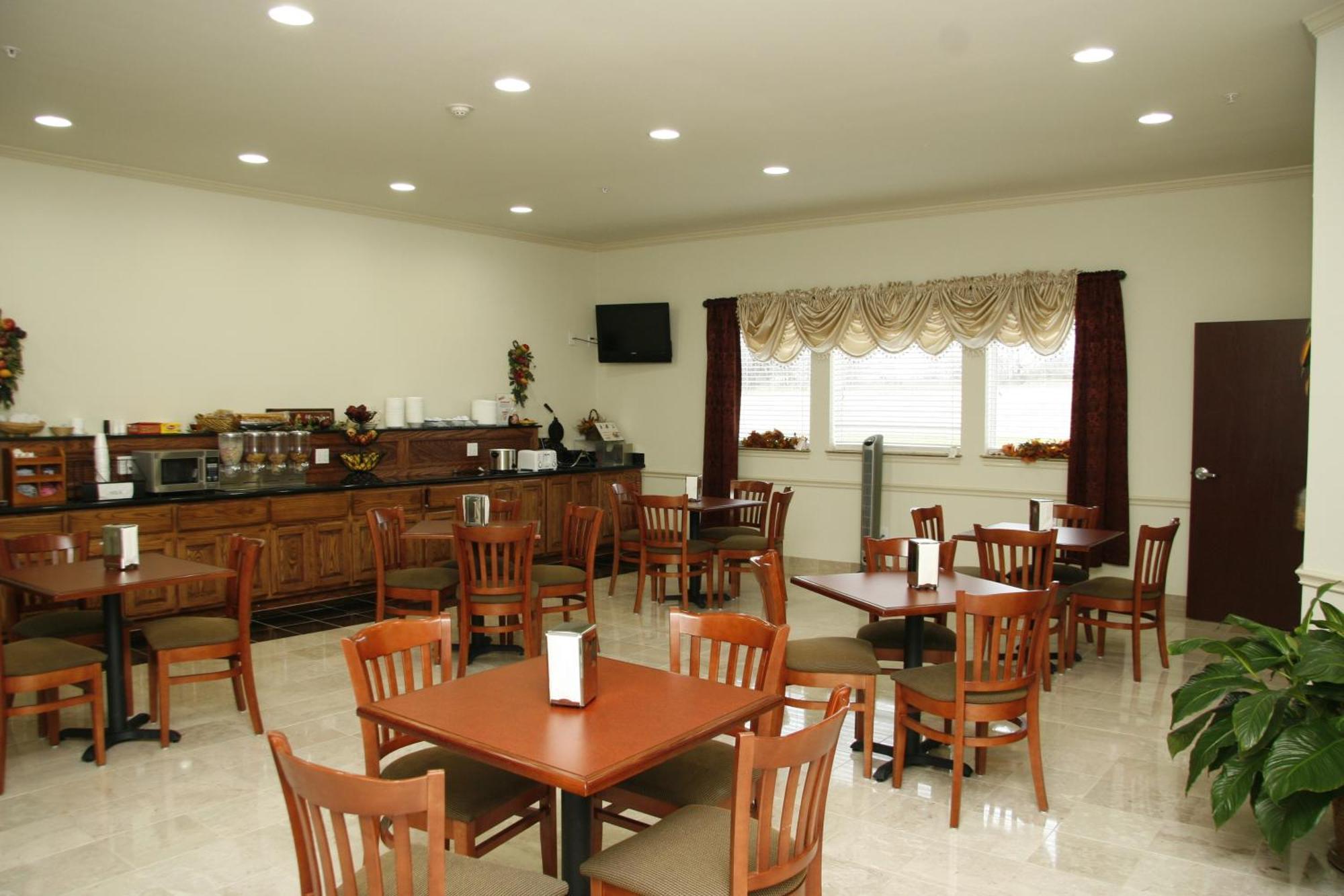 Budget Host Inn And Suites Cameron Chambre photo